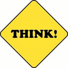 Abright yellow sign that says THINK