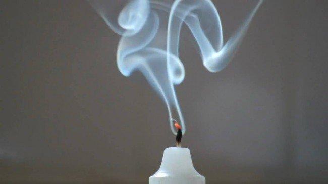 smoke rising from a snuffed out candle